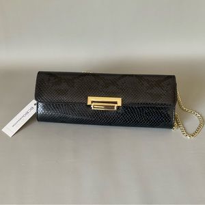 NWT, BCBGeneration, black animal print clutch